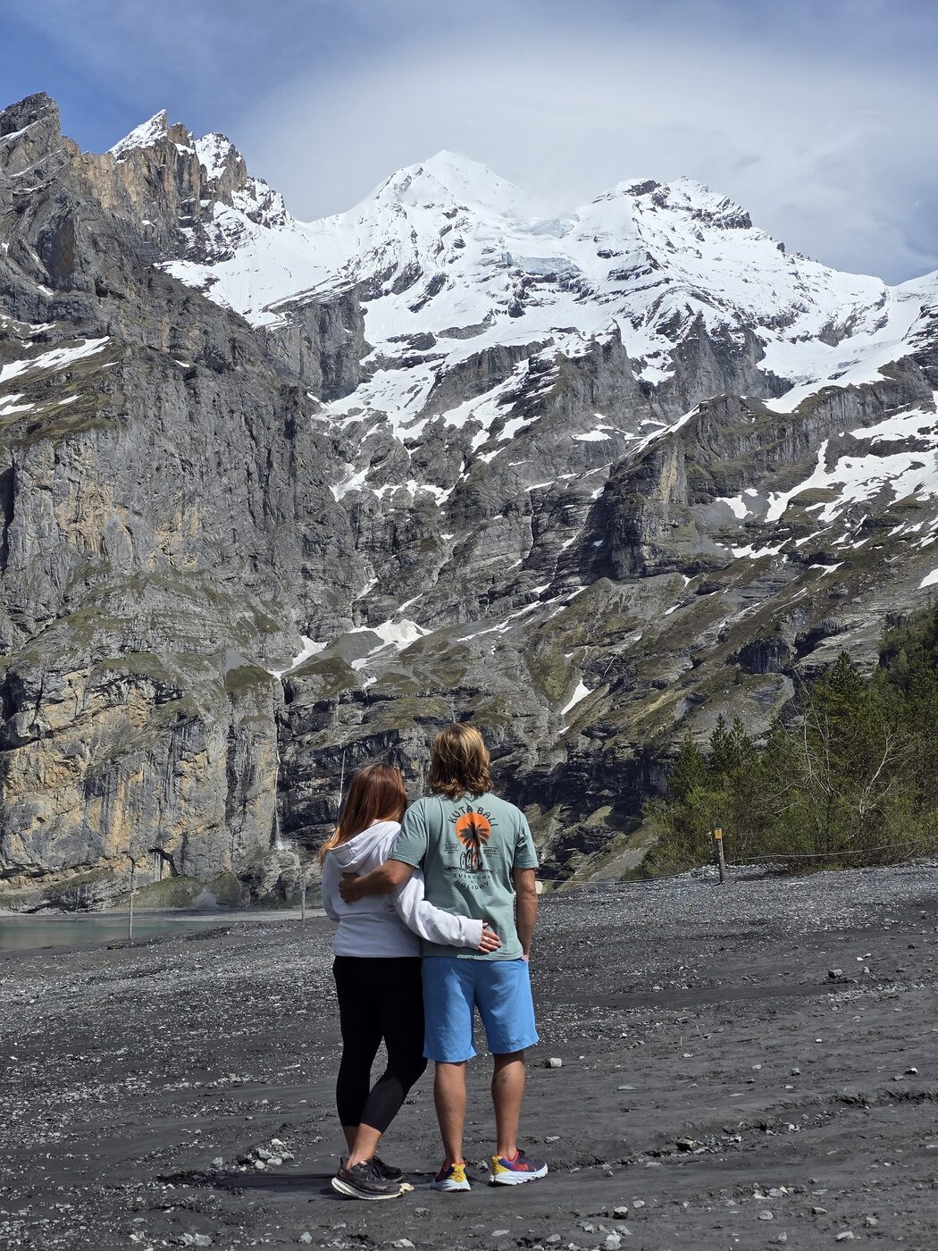 Jesse and Karlee looking up at snowy peaks in Switzerland