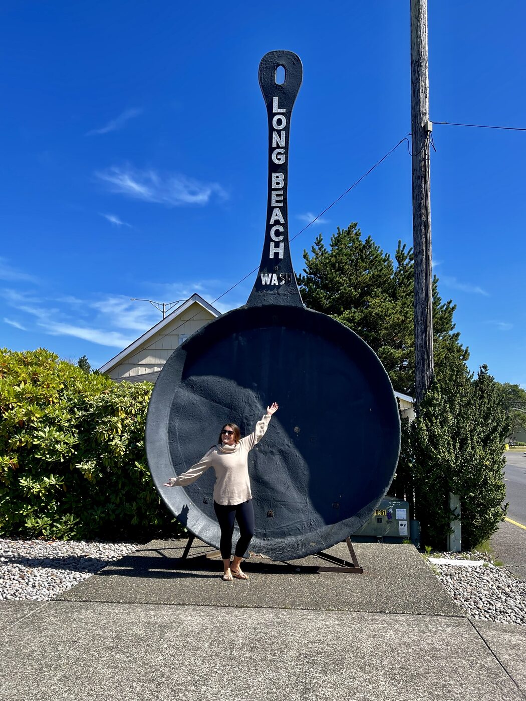 Standing in front of a giant frying pan sign in Long Beach